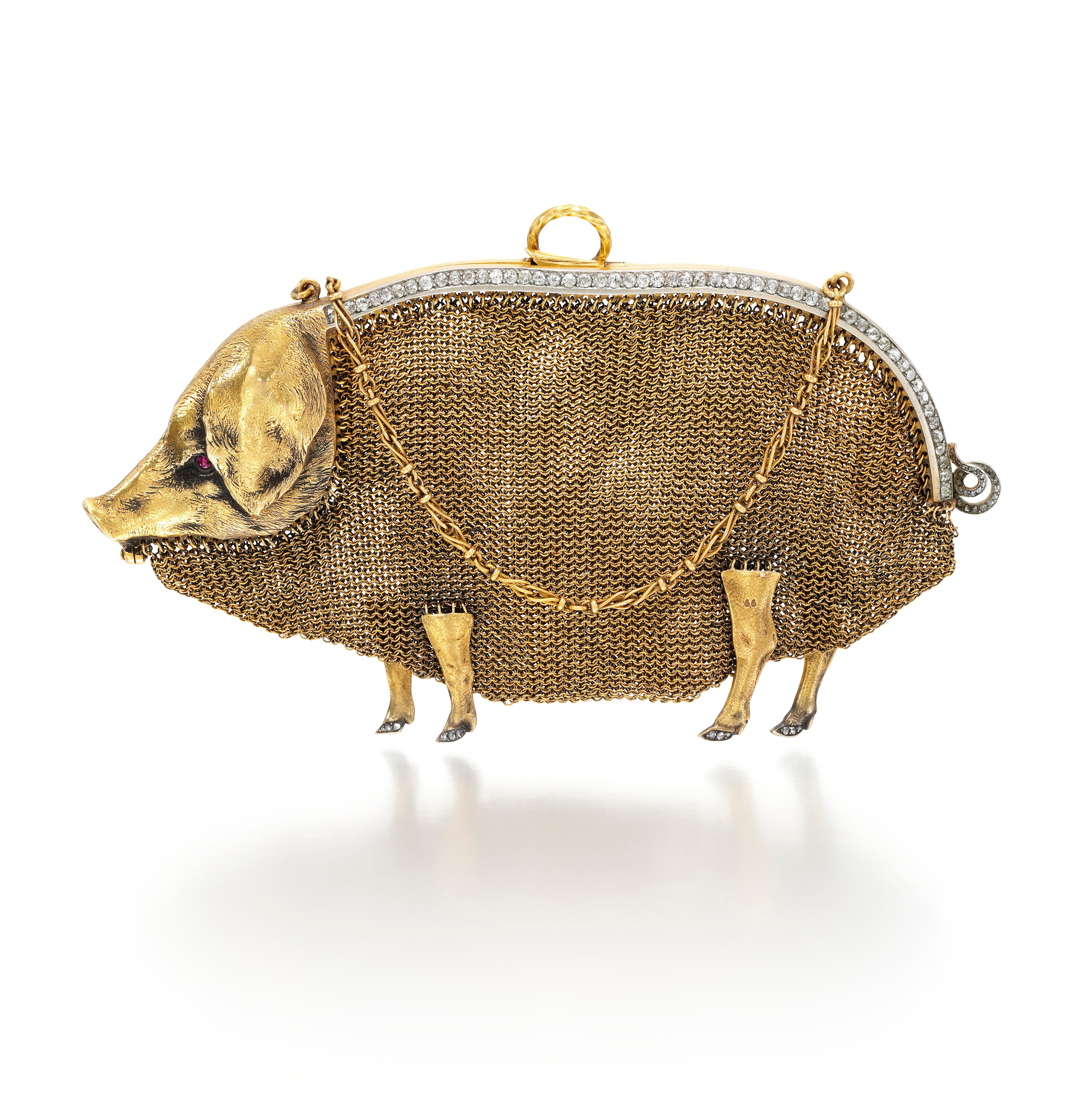 An_unusual_and_amusing_gem-set_gold_mesh_purse_by_Lacloche_Frères_Paris_circa_1905_(est._£2_000-3_000).jpg