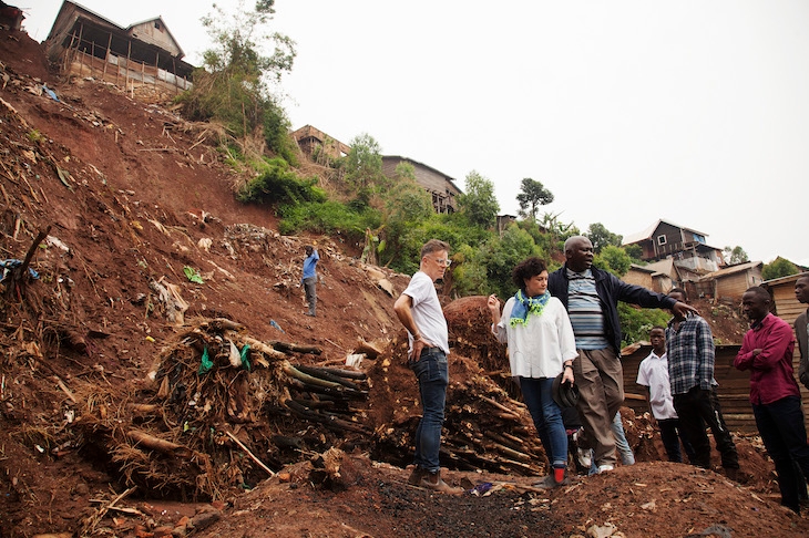 Fr_Justin_shows_us_the_scene_of_the_landslide.jpg